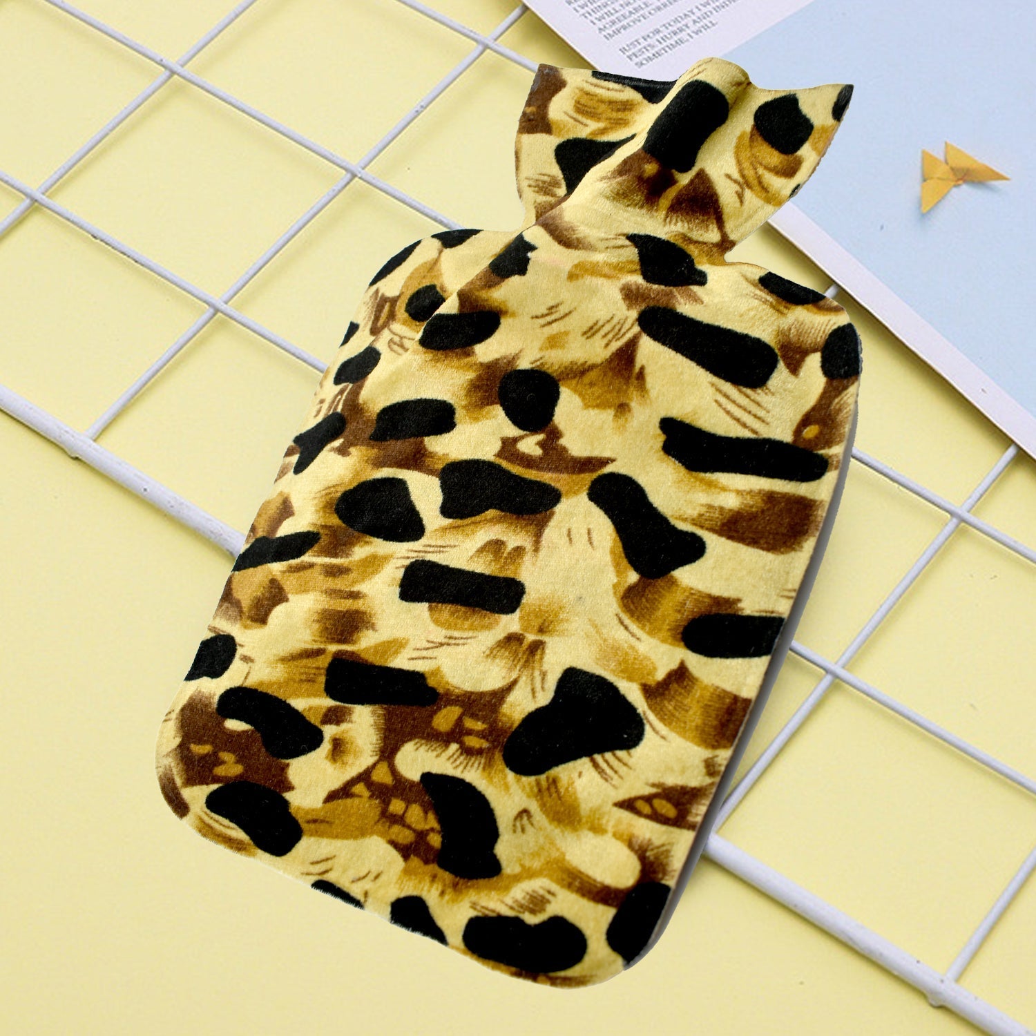 Large rubber heating pad bag placed on a surface, emphasizing its size and usability Large rubber heating pad bag placed on a surface, emphasizing its size and usability